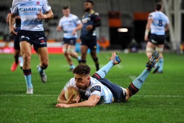 Mark Nawaqanitawase of the Waratahs scores a try during the round four Super Rugby Trans-Tasman match between the Highlanders and the NSW Waratahs at...