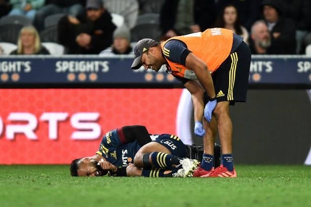 Jona Nareki of the Highlanders receives medical assistance during the round four Super Rugby Trans-Tasman match between the Highlanders and the NSW...