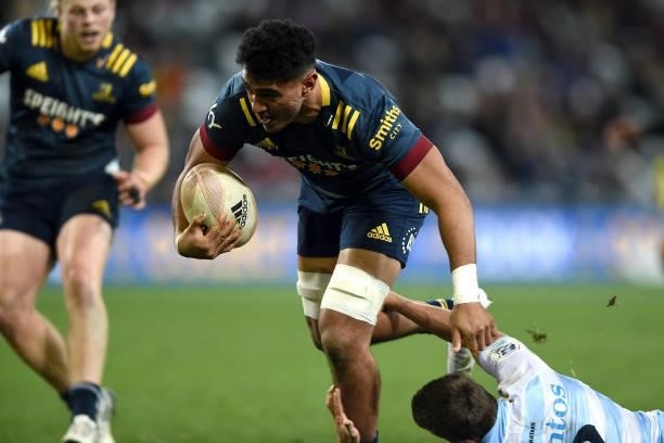 Teariki Ben-Nicholas of the Highlanders makes his way towards the try line during the round four Super Rugby Trans-Tasman match between the...