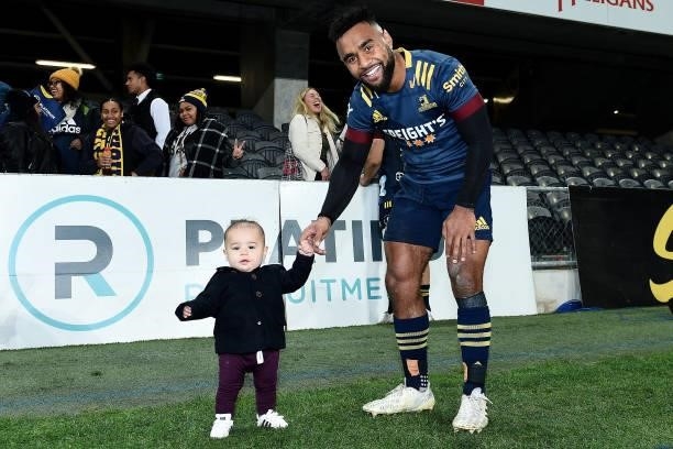 Jona Nareki of the Highlanders poses for a photo with his son during the round four Super Rugby Trans-Tasman match between the Highlanders and the...