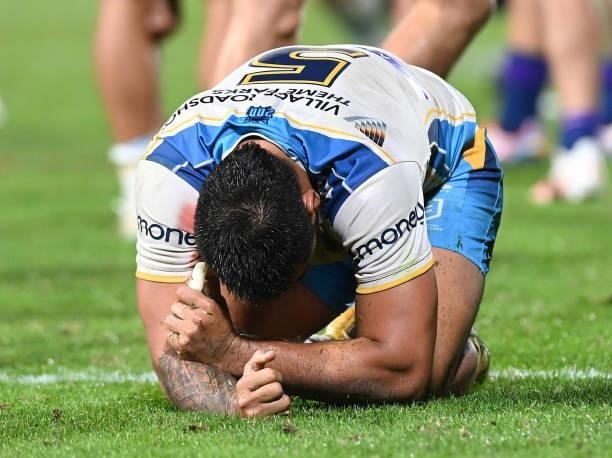 Phillip Sami of the Titans is dejected after the Titans were defeated by the Storm during the round 13 NRL match between the Melbourne Storm and the...
