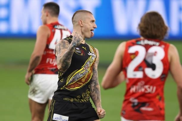 Dustin Martin of the Tigers celebrates a goal during the round 12 AFL match between the Essendon Bombers and the Richmond Tigers at Optus Stadium on...