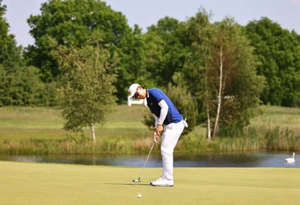 Jazz Janewattananond of Thailand putts on the fourth green during the first round of the Porsche European Open at Green Eagle Golf Course on June 05,...