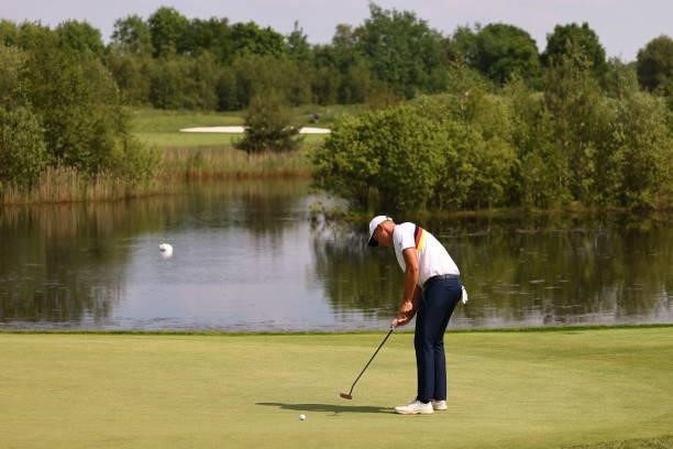 Amateur Matthias Schmid of Germany putts on the fourth green during the first round of the Porsche European Open at Green Eagle Golf Course on June...
