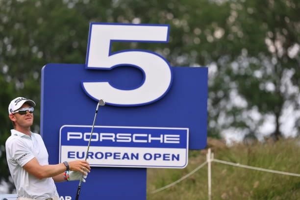 Joachim B. Hansen of Denmark tees off on the fifth hole during the first round of the Porsche European Open at Green Eagle Golf Course on June 05,...