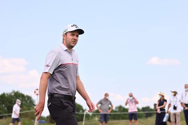 Ashley Chesters of England walks down the on the fifth hole during the first round of the Porsche European Open at Green Eagle Golf Course on June...