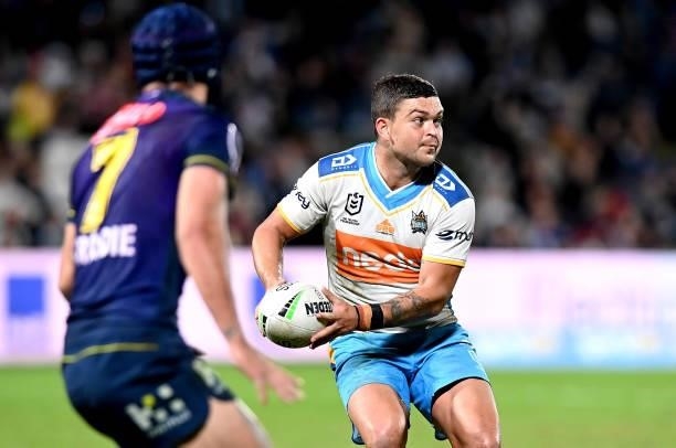 Ashley Taylor of the Titans looks to pass during the round 13 NRL match between the Melbourne Storm and the Gold Coast Titans at Sunshine Coast...