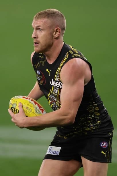 Josh Caddy of the Tigers in action during the round 12 AFL match between the Essendon Bombers and the Richmond Tigers at Optus Stadium on June 05,...