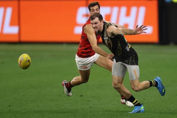 Kamdyn McIntosh of the Tigers in action during the round 12 AFL match between the Essendon Bombers and the Richmond Tigers at Optus Stadium on June...