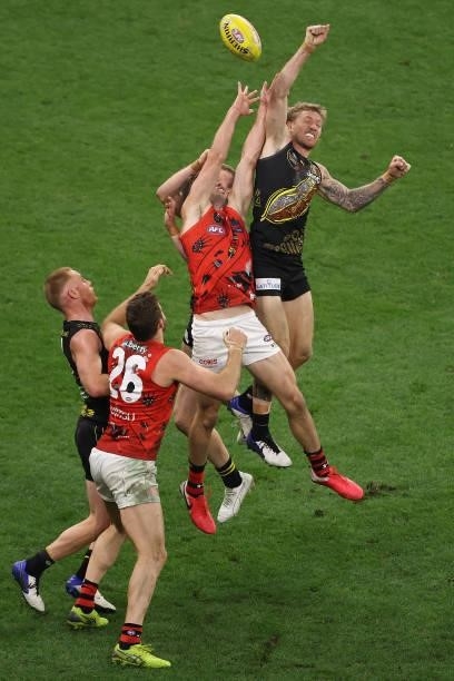 Nathan Broad of the Tigers spoils the mark during the round 12 AFL match between the Essendon Bombers and the Richmond Tigers at Optus Stadium on...