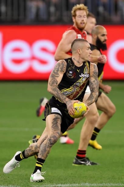 Dustin Martin of the Tigers in action during the round 12 AFL match between the Essendon Bombers and the Richmond Tigers at Optus Stadium on June 05,...