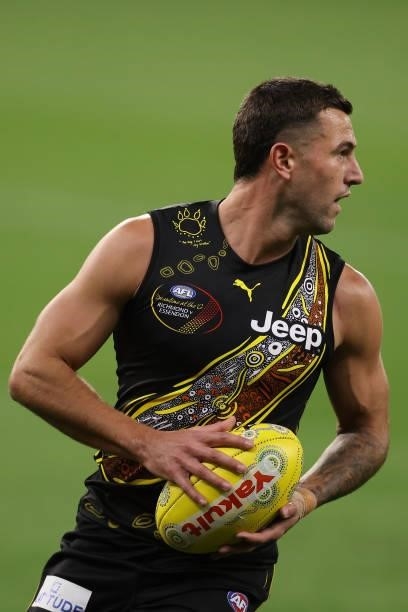 Jack Graham of the Tigers in action during the round 12 AFL match between the Essendon Bombers and the Richmond Tigers at Optus Stadium on June 05,...