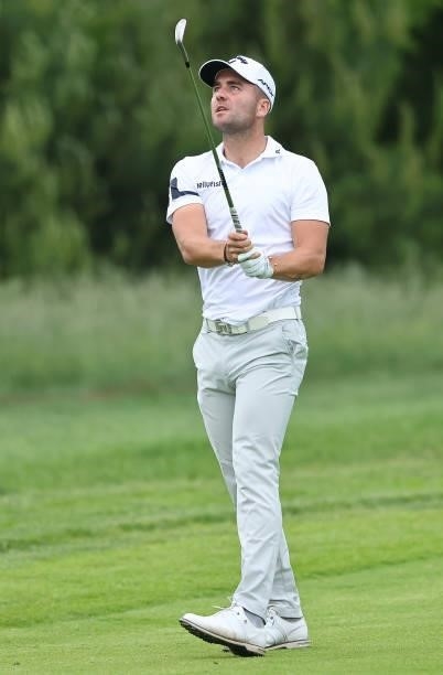 Toby Tree of England plays his second shot on the fourth hole during the first round of the Porsche European Open at Green Eagle Golf Course on June...