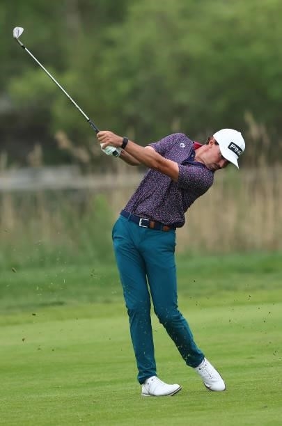Paul Peterson of the United States plays his third shot on the fourth hole during the first round of the Porsche European Open at Green Eagle Golf...