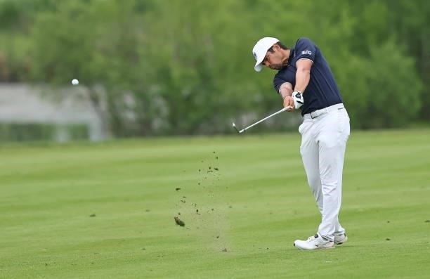 Adrien Saddier of France plays his second shot on the fourth hole during the first round of the Porsche European Open at Green Eagle Golf Course on...
