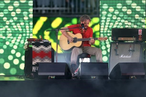 John Butler performs during the round 12 AFL match between the Essendon Bombers and the Richmond Tigers at Optus Stadium on June 05, 2021 in Perth,...
