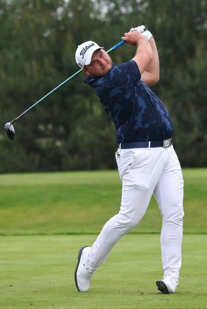 Zander Lombard of South Africa tees off on the fourth hole during the first round of the Porsche European Open at Green Eagle Golf Course on June 05,...