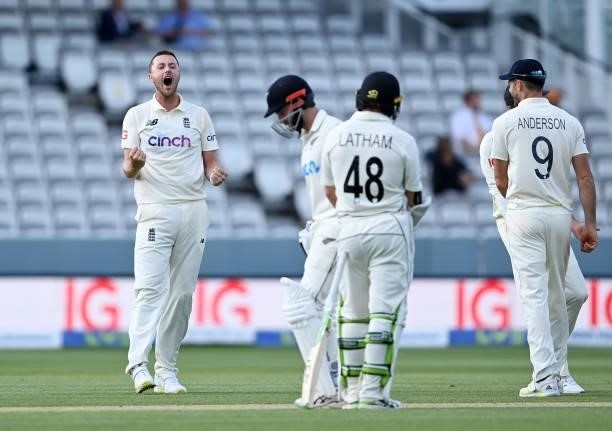 Ollie Robinson of England celebrates the successful review to dismiss Kane Williamson of New Zealand during Day 4 of the First LV= Insurance Test...