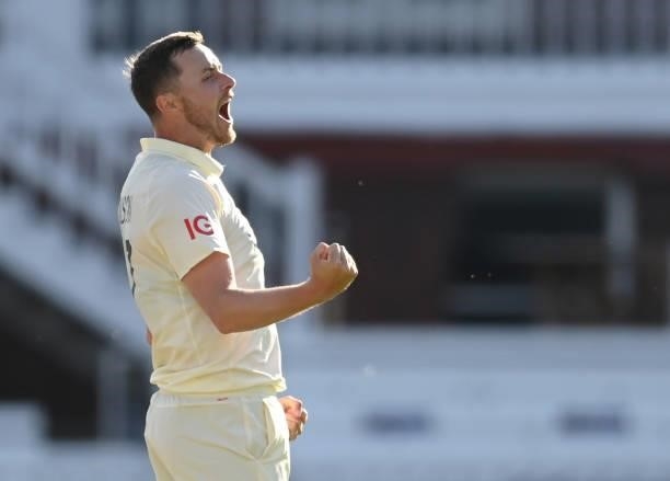 Ollie Robinson of England celebrates dismissing Kane Williamson of New Zealand before it was overturned and he was not out during Day 4 of the First...