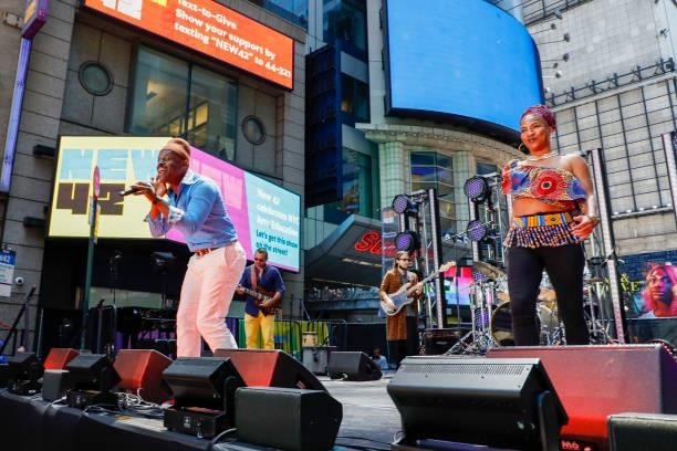 Sahr Ngaujah, Rachel Oneika Phillips, and Chop and Quench, “The Fela! Band” perform during Let's Get This Show On The Street: New 42 Celebrates NYC...