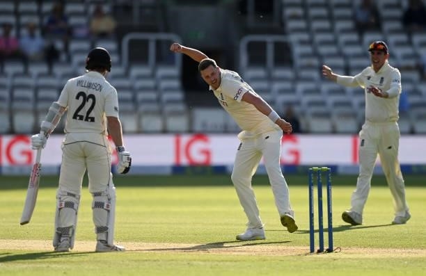 Ollie Robinson of England celebrates taking the wicket of Kane Williamson of New Zealand which later overturned by a DRS review during Day 4 of the...