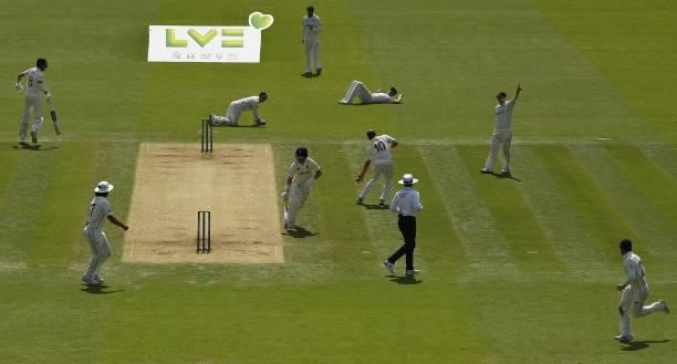 Rory Burns of England runs to the near end as Neil Wagner tries to catch the ball after Burns was dropped by Tim Southee and Ross Taylor during Day 4...