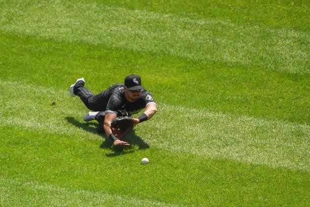 Jake Lamb of the Chicago White Sox can't make the diving catch in the second inning against the Detroit Tigersat Guaranteed Rate Field on June 05,...