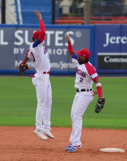 Jeison Guzmán and Gustavo Núñez of Dominican Republic celebrates after coming from behind to defeat Canada by score of 6-5 during the WBSC Baseball...