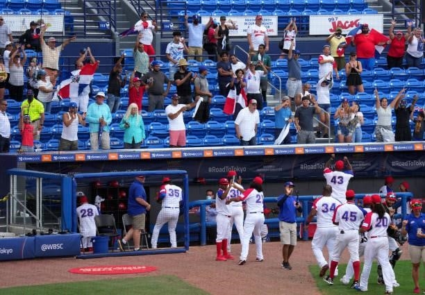 Fans of the Dominican Republic cheer for the team after coming from behind to defeat Canada by score of 6-5 during the WBSC Baseball Americas...