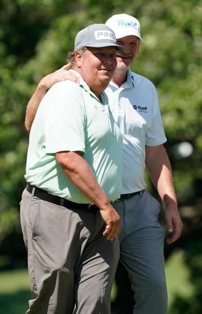 Tim Herron is congratulated by Tom Gillis after their second round of the Principal Charity Classic at Wakonda Club on June 05, 2021 in Des Moines,...