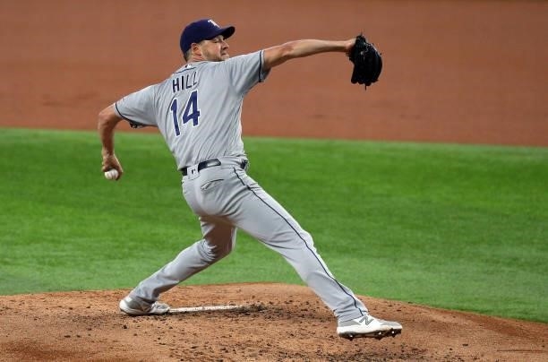 Rich Hill of the Tampa Bay Rays pitches in the first inning against the Texas Rangers at Globe Life Field on June 05, 2021 in Arlington, Texas.