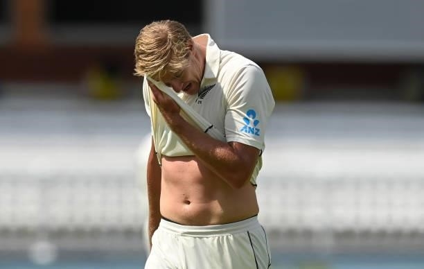 Kyle Jamieson of New Zealand wipes his face during Day 4 of the First LV= Insurance Test match between England and New Zealand at Lord's Cricket...