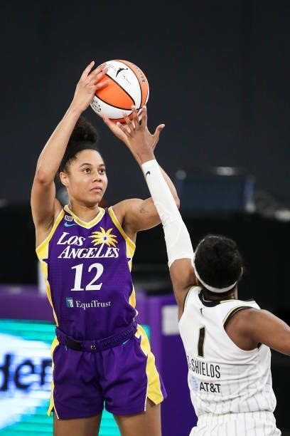 Nia Coffey of the Los Angeles Sparks shoots defended by Diamond DeShields of the Chicago Sky during the second half at Los Angeles Convention Center...