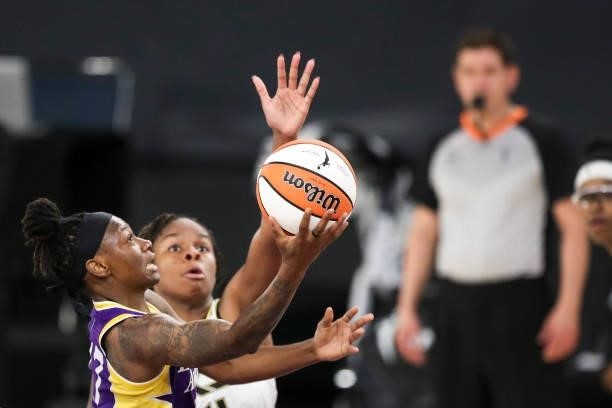 Erica Wheeler of the Los Angeles Sparks drives to the basket defended by Ruthy Hebard of the Chicago Sky at Los Angeles Convention Center on June 05,...