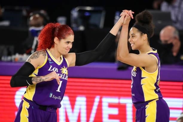 Amanda Zahui B and Nia Coffey of the Los Angeles Sparks celebrate their win over the Chicago Sky at Los Angeles Convention Center on June 05, 2021 in...