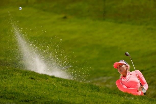 Lexi Thompson of the United States hits from the bunker on the third hole during the third round of the 76th U.S. Women's Open Championship at The...