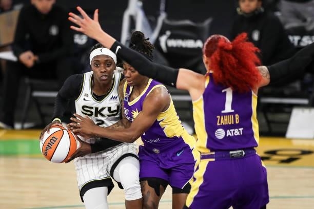 Kahleah Copper of the Chicago Sky handles the ball defended by Erica Wheeler of the Los Angeles Sparks at Los Angeles Convention Center on June 05,...