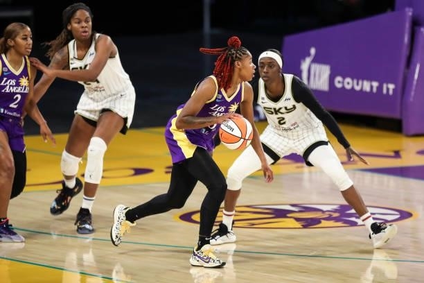 Bria Holmes of the Los Angeles Sparks handles the ball defended by Kahleah Copper of the Chicago Sky at Los Angeles Convention Center on June 05,...