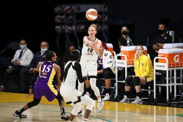 Courtney Vandersloot of the Chicago Sky passes the ball defended by Brittney Sykes of the Los Angeles Sparks at Los Angeles Convention Center on June...