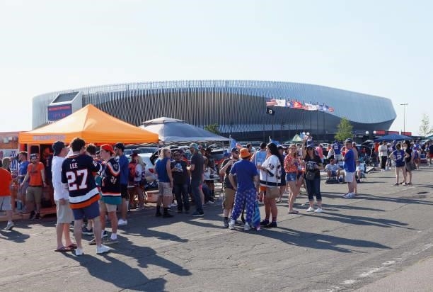 Fans tailgate prior to the game between the New York Islanders and the Boston Bruins in Game Four of the Second Round of the 2021 NHL Stanley Cup...