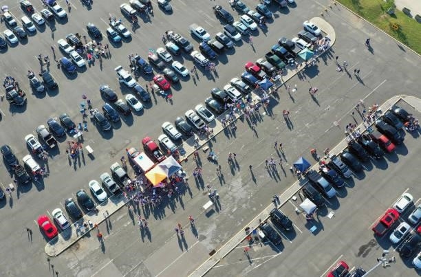 In an aerial view, fans tailgate prior to the game between the New York Islanders and the Boston Bruins in Game Four of the Second Round of the 2021...