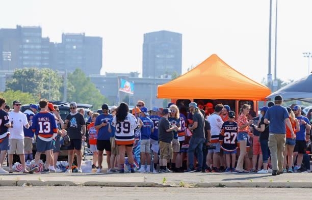 Fans tailgate prior to the game between the New York Islanders and the Boston Bruins in Game Four of the Second Round of the 2021 NHL Stanley Cup...