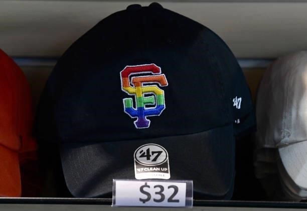 Detailed view of hats with the Giants logo dressed in rainbow colors that symbolize the LGBT community being sold at concession stands inside the...