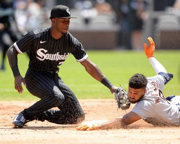 Tim Anderson of the Chicago White Sox tags Willi Castro of the Detroit Tigers in the face but did not have the ball in his glove on June 5, 2021 at...