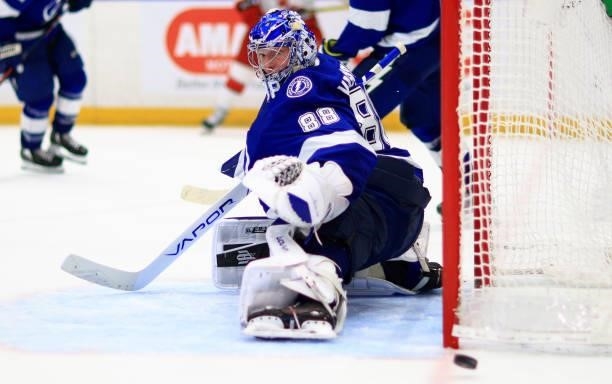 Andrei Vasilevskiy of the Tampa Bay Lightning makes a save during Game Four of the Second Round of the 2021 Stanley Cup Playoffs against the Carolina...