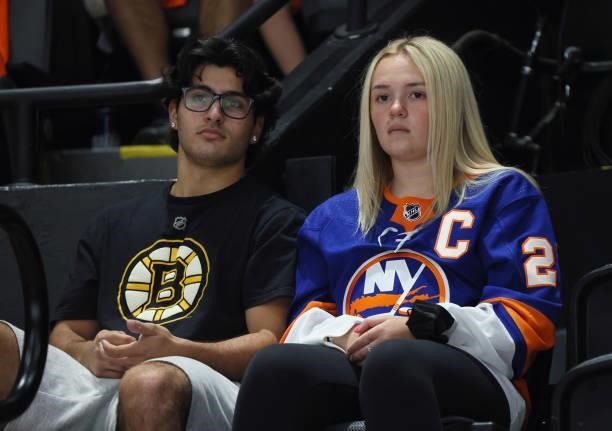 Fans watch warm-ups prior to the game between the New York Islanders and the Boston Bruins in Game Four of the Second Round of the 2021 NHL Stanley...