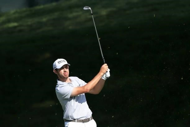 Patrick Cantlay of the United States plays a shot on the 15th hole during the third round of The Memorial Tournament at Muirfield Village Golf Club...