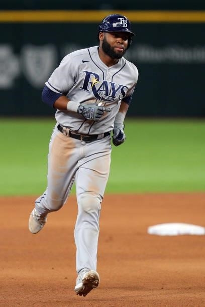 Manuel Margot of the Tampa Bay Rays runs the bases after hitting a solo home run against the Texas Rangers at Globe Life Field on June 05, 2021 in...