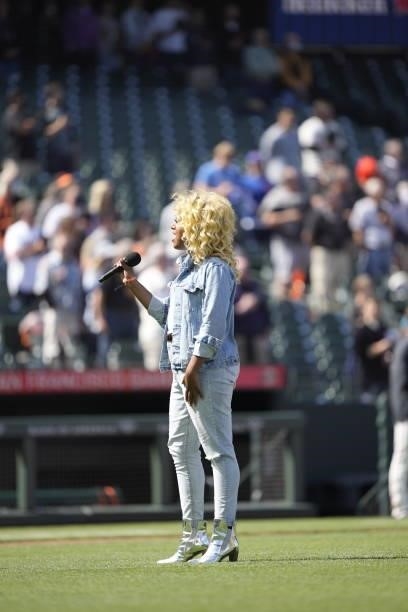 Honey Mahogany, an American activist, politician and drag performer, sings the National Anthem on San Francisco Pride Day prior to the game between...