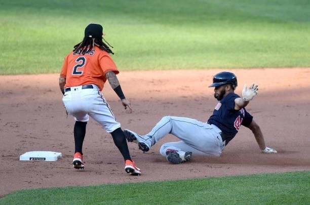 Bobby Bradley of the Cleveland Indians slides into second base with a double in the eighth inning against the Baltimore Orioles at Oriole Park at...